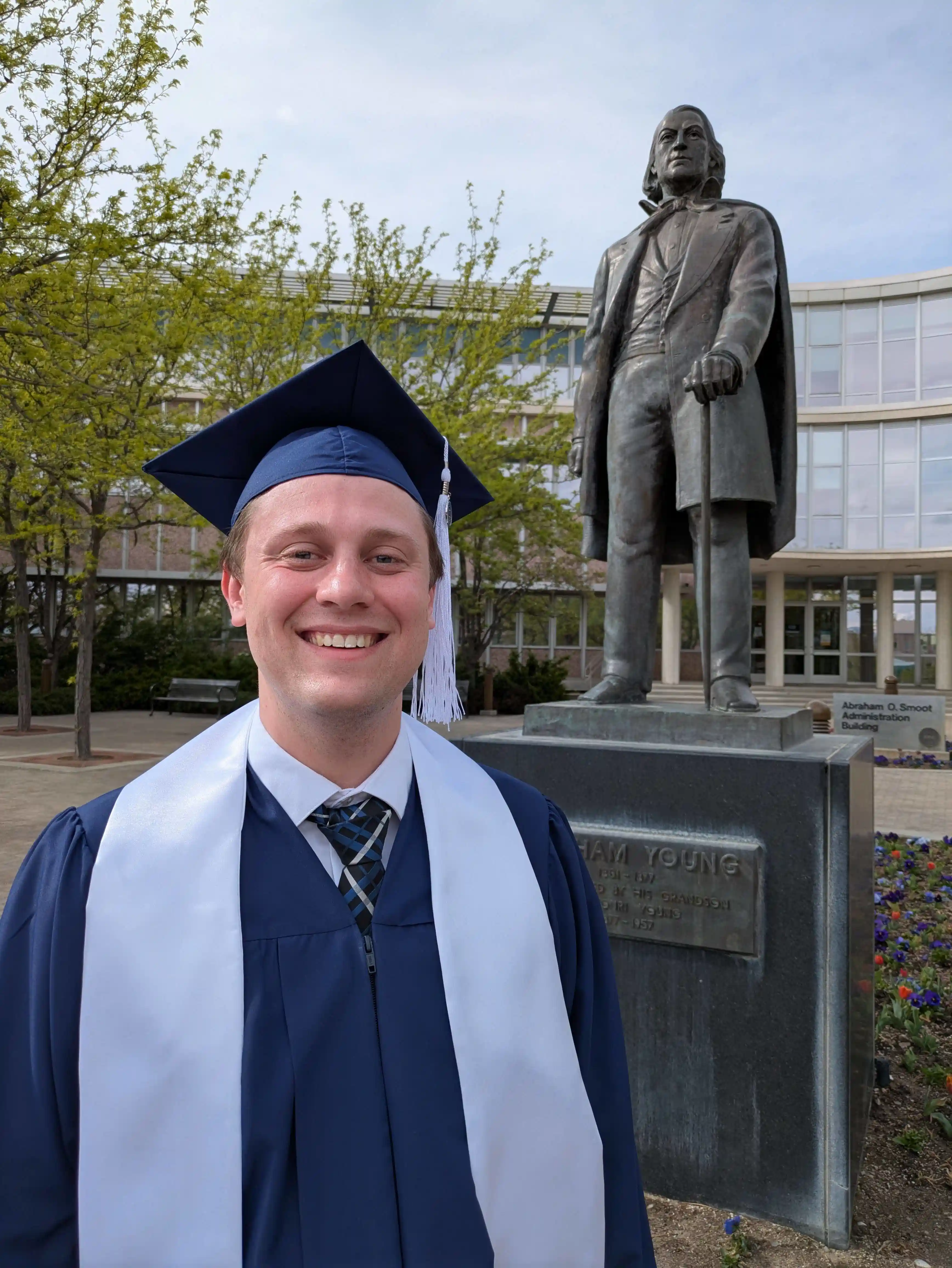 Image of me in front of the Brigham Young statue on BYU campus.